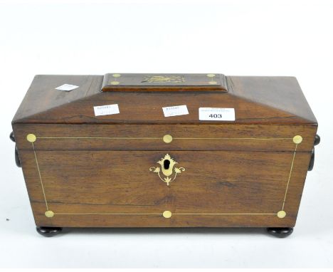 A 19th century rosewood tea caddy, of sarcophagus shape, the hinged lid enclosing two divisions (missing the lids) and raised