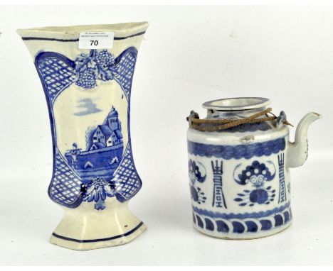 Two pieces of blue and white Delft ceramics, comprising a 19th Century vase with a flared rim, height 26cm, and a teapot with