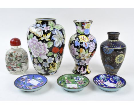A group of 20th century Chinese and Japanese items, to include two enamel vases with flowers on a black ground, a small clois