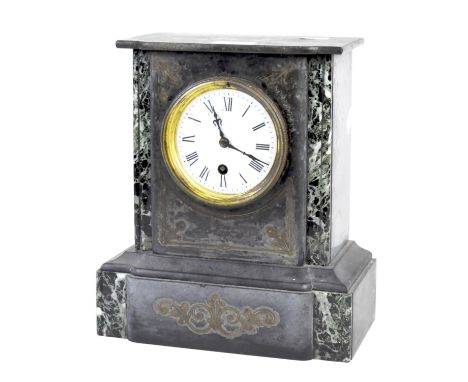 A Victorian slate mantle clock, white enamel dial with Roman numerals,  flanked by marble inserts, on a plinth base with carv