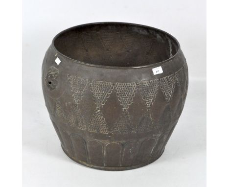A large cast metal planter, the copper structure decorated with lions and textured decoration, height 42cm