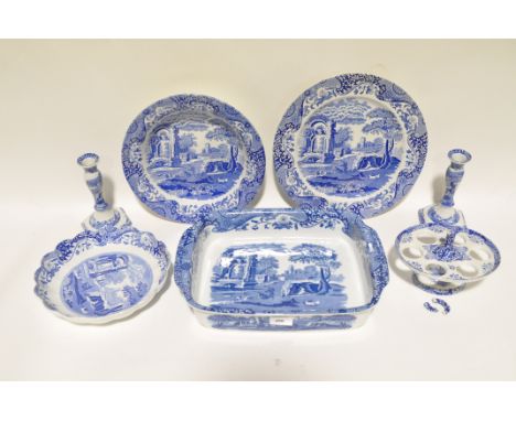 A collection of contemporary Spode ceramics, including a pair of candlesticks, a plate and bowls, all with blue and white dec