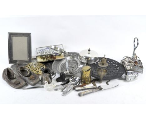 A selection of silver plate and collectables, to include a carved charger, a brass beaker, pair of child's leather shoes, a b