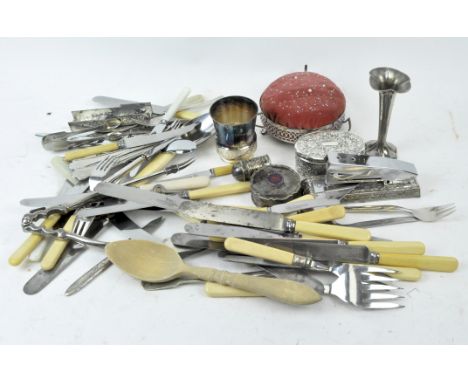 A collection of silver plated and stainless steel, comprising a trinket tray, pin cushion, stapler, flatware, a lidded pot an