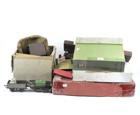 A selection of Hornby and Crane O gauge trains and accessories, including a locomotive numbered 67040 and a Silver Link locom