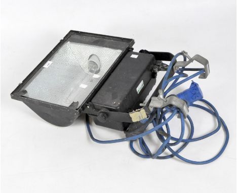 A large industrial outside light, with wall mounting bracket, light itself 41cm wide