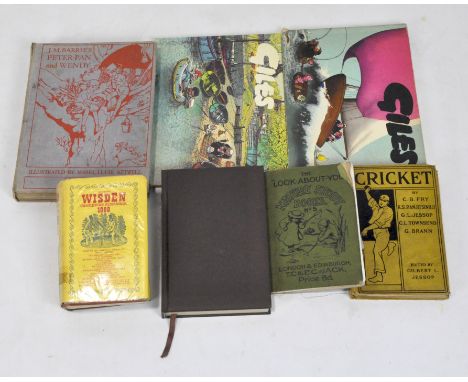 A collection of vintage books, including two Giles cartoon books, a 1968 Wisden Cricketers Manual and 'Peter Pan and Wendy' b
