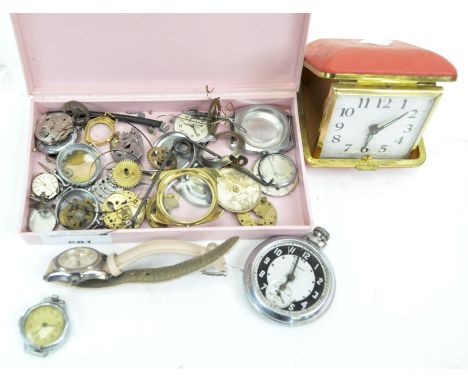 A collection of incomplete watches and components, including movements, faces, straps and more, together with a travelling al