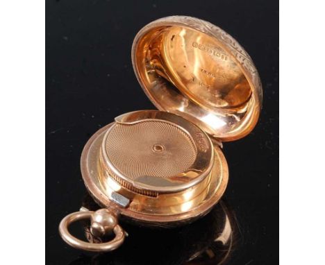 A George V 9 carat gold sovereign case, having all-over foliate engraved decoration and vacant cartouche, maker Dennison Watc