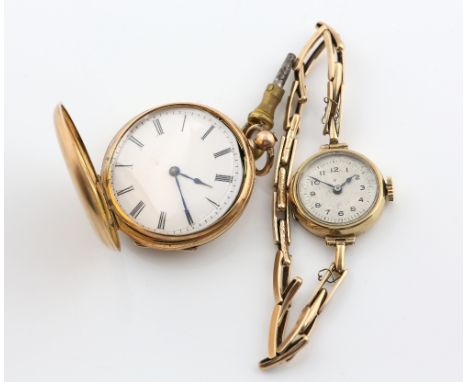  A ladies 9 carat gold wristwatch in circular case,the enamelled  dial with Arabic numerals and minute track, fitted with a m