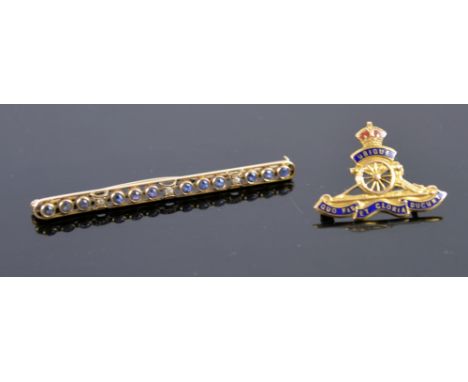 Jewellery box containing  an Edwardian sapphire and diamond bar brooch, enamel military brooch in 9 ct gold, gilt metal RAF b