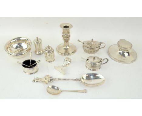 Group of silver items to include a small bowl, inkwell, dwarf candlestick, large spoon with figural finial, cruets, etc. gros