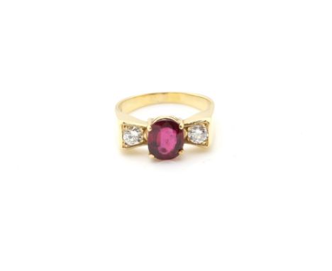 Modern ruby and diamond ring, central oval cut ruby, estimated weight 1.70 carats, two round brilliant cut diamonds, estimate