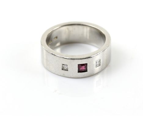  Harriet Kelsall contemporary ruby and diamond ring, central square cut ruby, set in-between two princess cut diamonds, mount