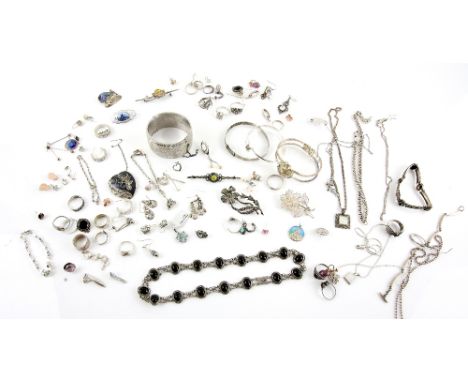 A group of mainly silver jewellery, including engine turned oval bangle, hallmarked Birmingham 1944, a pair of mother of pear