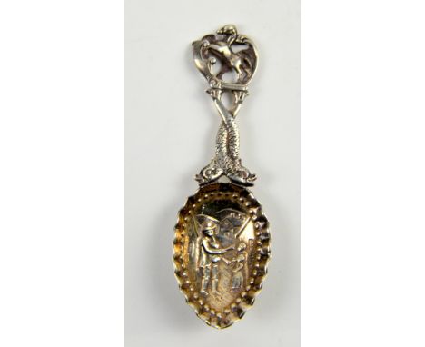Fish handled with horse finial silver caddy spoon.    