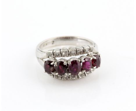 1940's ruby and diamond ring, five claw set oval cut rubies and two outer rows of Swiss cut diamonds, mount stamped 18 ct, ri