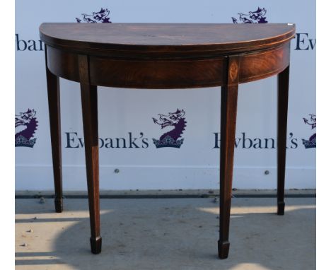 19th century mahogany folding card table .    