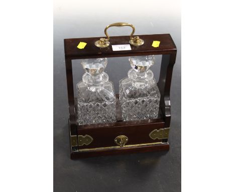 A MODERN TWO DECANTER TANTALUS - WITH KEY