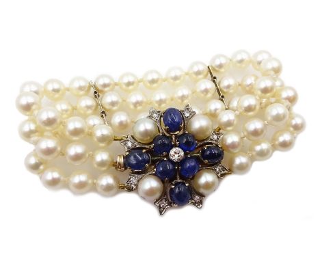  Three row cultured pearl bracelet, two spacers set with diamonds, on gold cabochon sapphire, diamond and pearl clasp    - Co