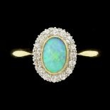 Early 20th century opal and old cut diamond cluster ring