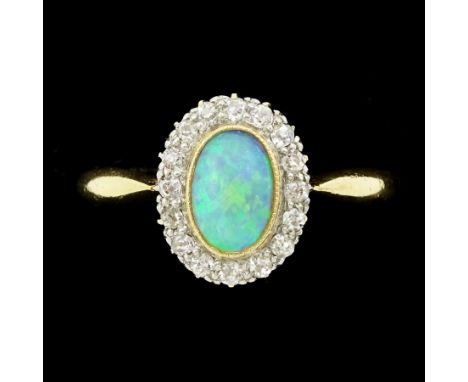Early 20th century opal and old cut diamond cluster ring, stamped 18ctCondition Report:Approx 3.15gm, size Q, overall head = 
