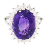 18ct white gold oval cut amethyst and round brilliant cut diamond cluster ring