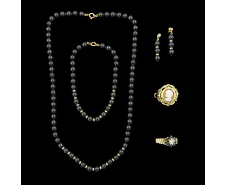 9ct gold jewellery including cameo ring, sapphire and diamond cluster ring, black onyx and gold bead necklace and a pair of m