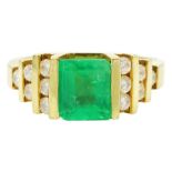 18ct gold emerald and diamond stepped design ring
