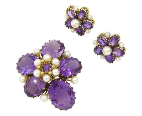 Early 20th century 9ct gold amethyst and pearl flower head brooch and a similar pair of 9ct gold stud earringsCondition Repor