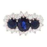 18ct white gold three stone oval and round cut sapphire and round brilliant cut diamond cluster ring
