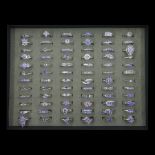 Seventy-two silver tanzanite rings