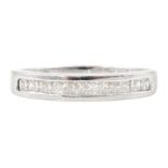 Platinum channel set princess cut diamond half eternity ring
