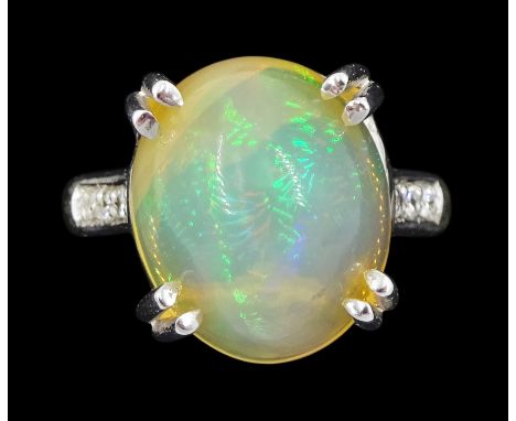 18ct white gold single stone opal ring, with round brilliant cut diamond shoulders, hallmarked, opal approx 6.65 caratConditi