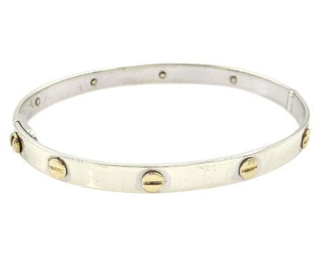 9ct white and yellow gold screw design hinged bangleCondition Report:Approx 23.7gm, inner circumference = 19.2cm, scratches a