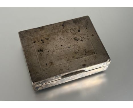 Military interest: a George VI silver cigarette box, Mappin &amp; Webb, London 1939, oblong, with engine-turned decoration, t