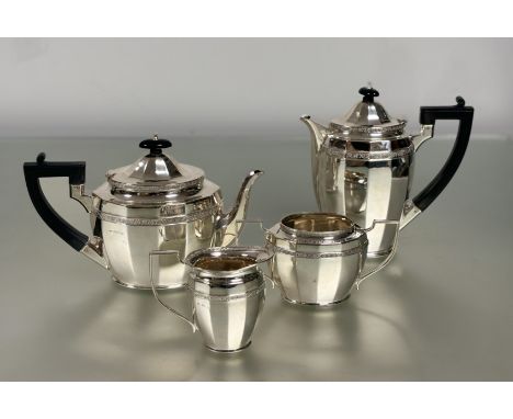 A George V four piece silver tea and coffee service, A.E. Poston &amp; Co., Birmingham 1934, each piece of faceted oval form,