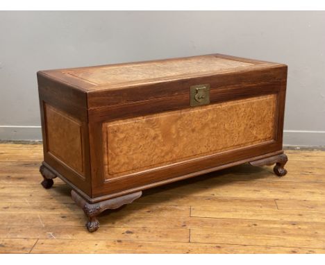 A Chinese rosewood blanket box, late 20th century, the lid and case with fielded burr elm panels, opening to a camphor wood l