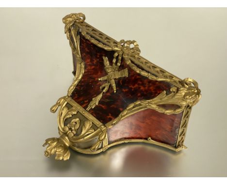 A tortoise shell and ormolu / gilt bronze mounted clock bracket of Neo-Classical design, late 18th century, decorated with fl