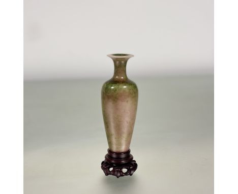 A Chinese porcelain "Willow Leaf" peach bloom porcelain vase, of characteristic form, glazed in typical red/green tones with 