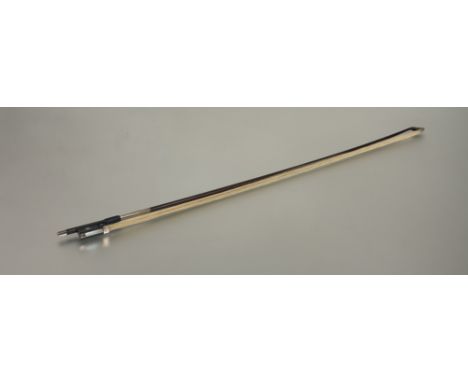 An English silver-mounted violin bow by W.E. Hill &amp; Sons, stamped "W.E. Hill &amp; Sons", the stick round, the ebony frog