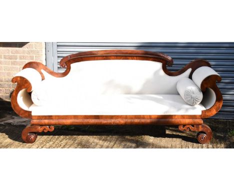 A large 19th century Continental mahogany framed scroll arm sofa, width approx. 215cm.