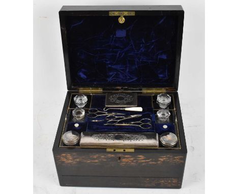 LUND, LONDON; a 19th century coromandel cased vanity set with part fitted interior, with purchase receipt from Tudor Antiques