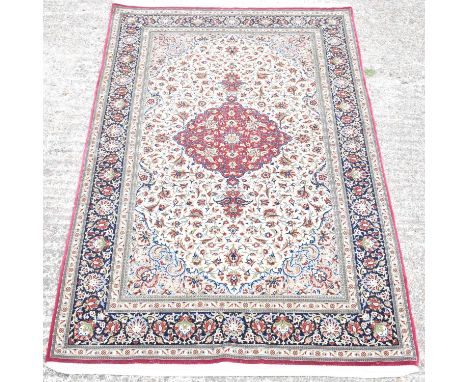 A fine Persian hand knotted woollen Kashan carpet, 231 x 142cm. Condition Report: Condition of this item appears very good, a