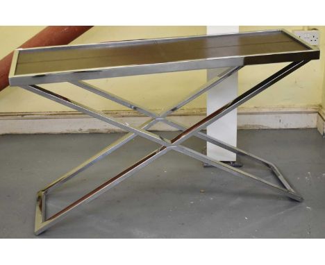 A modern chrome X-frame console table with inset leather top, length 125cm, width 40cm.