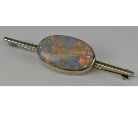A white metal opal set brooch, length 5cm, approx. 5.6g.