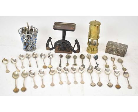 A group of silver plated commemorative collectors' spoons, a miner's lamp, a trinket box etc. 