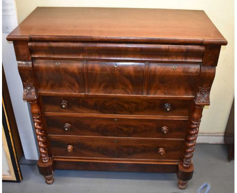 A large Victorian mahogany Scotch type chest with cushion drawer above three deep cushion drawers and three further long draw