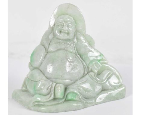 A Chinese jade carving of a seated Buddha, height 10cm.