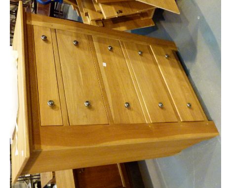 Large light wood five drawer chest of drawers and matching wardrobe
